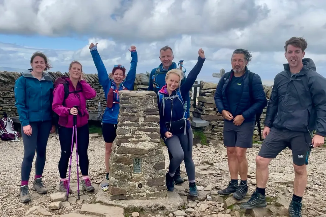 ASL team at a summit trig point on the Yorkshire Three Peaks route, August 2021, fundraising for Alzheimer’s Society.